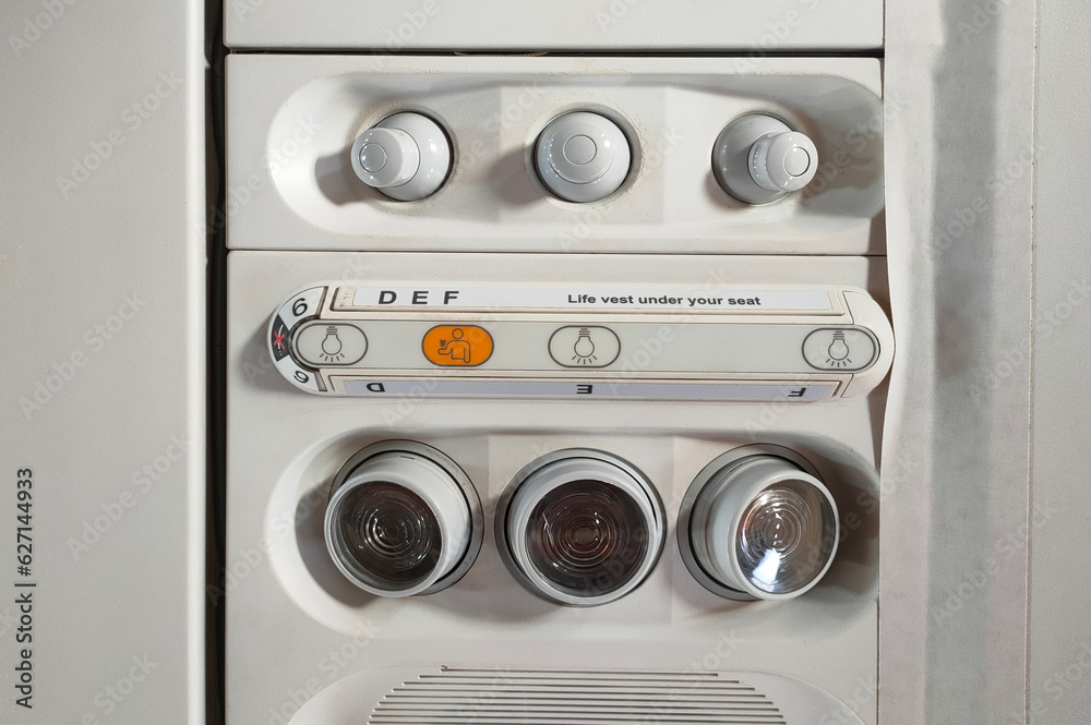 light switch and air conditioning on an airplane light switch and air conditioning on an airplane