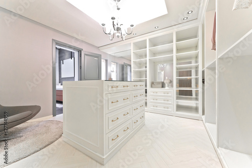 Dressing room decorated with white furniture is beautiful and elegant