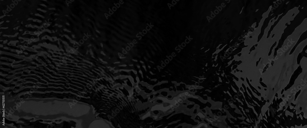Black water background with ripples, black water banner and surface of dark nature background, black water texture, top view of sea waves, black water, background texture.