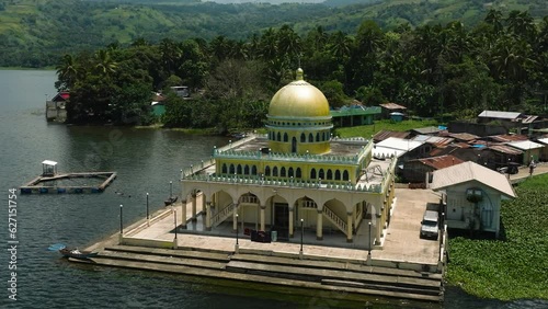 Beautiful view of Linuk Masjid a mosque beside the Lake Lanao in Lanao del Sur. Mindanao, Philippines. photo