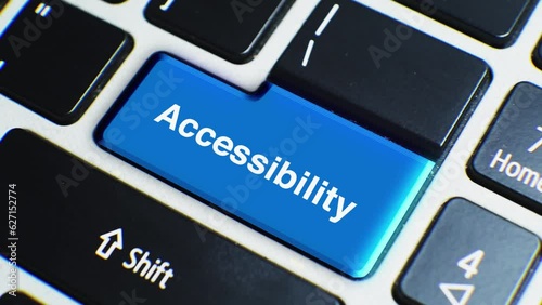 Laptop Keyboard Close Up and Finger Press Accessibility Word or Text Button Key.