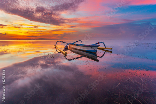 Morning in Bali, Indonesia. Traditional fishing boats at Sanur beach, Bali, Indonesia.