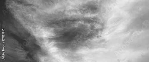 Gllomy sky with dark gray clouds, sky with storm clouds dark, The dark sky with heavy clouds converging and a violent storm before the rain, bad or moody weather sky. 