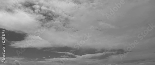 Panorama view of overcast sky, dramatic gray sky and white clouds before rain in rainy season, cloudy gray sky with thick dense clouds, sky with storm clouds dark, The dark sky with heavy clouds. 