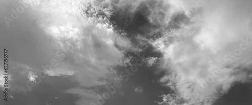 Gllomy sky with dark gray clouds, sky with storm clouds dark, The dark sky with heavy clouds converging and a violent storm before the rain, bad or moody weather sky. 