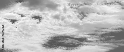 Gllomy sky with dark gray clouds, sky with storm clouds dark, The dark sky with heavy clouds converging and a violent storm before the rain, bad or moody weather sky. 