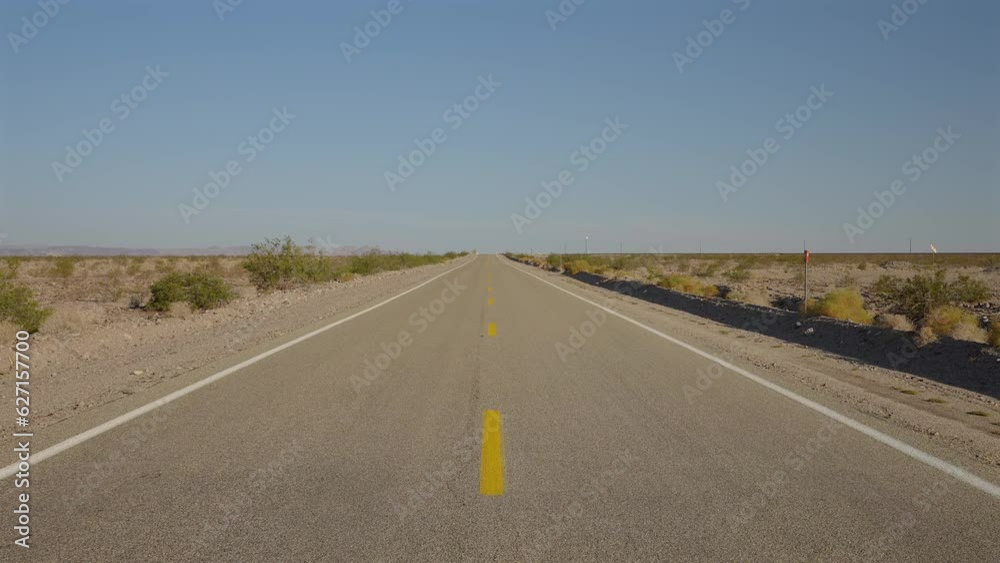Discover a forgotten path through the vast desert, where an old, solitary road winds its way into the horizon Discover a forgotten path through the vast desert, where an old, solitary road winds its way into the horizon