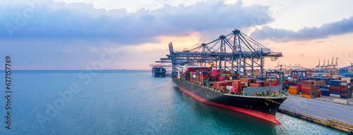 Schilderij op canvas Container ship cargo loading and unloading in sea port, Global business logistic import and export freight transportation by container ship in harbor, Container loading cargo freight ship