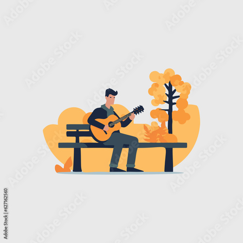 man sitting playing a song on guitar