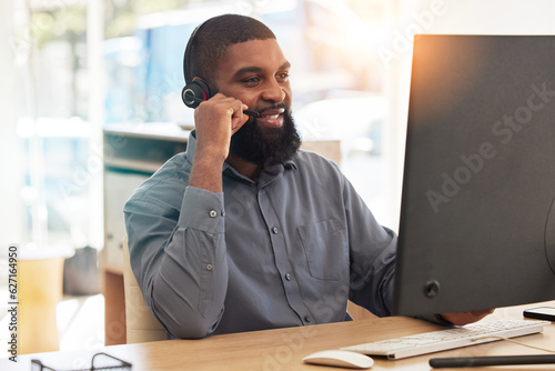 Man, computer and call center for communication, happy sales advisor and customer support in e commerce. Agency worker, telecom and african person with virtual chat, helping or web contact on desktop