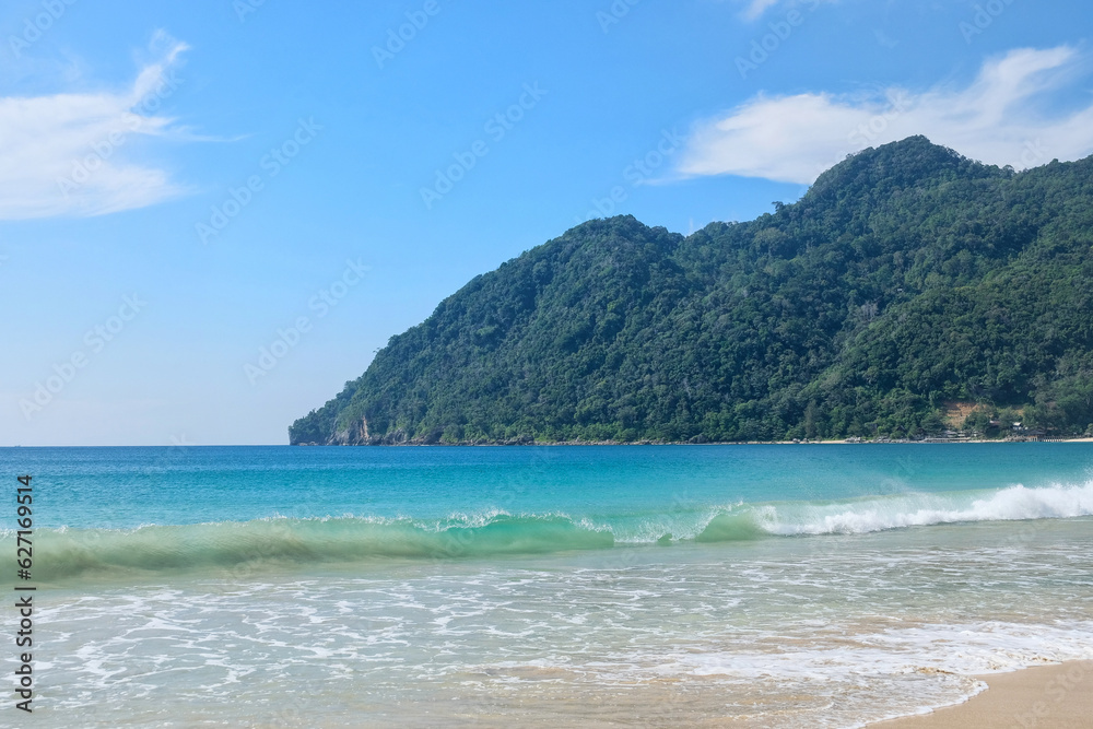 Blue sea water, white sand, clear water, the fisherman boat, with mountain as its backrground, the landscape of Aceh is amazing.