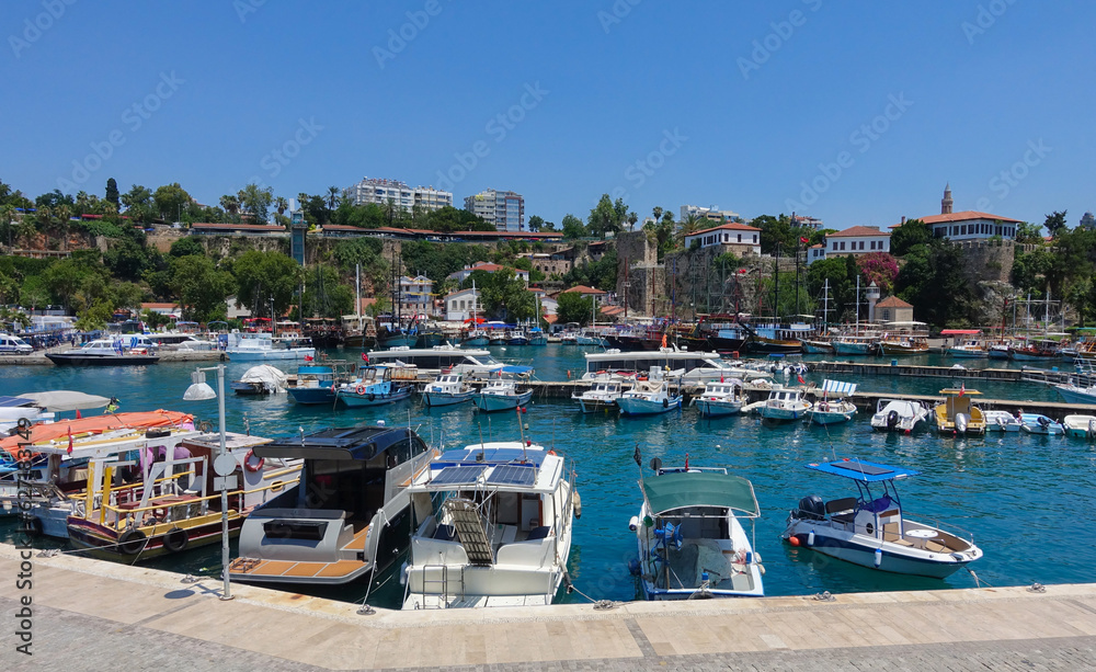 Antalya marina Turkey with boats and yachts in the harbour and blue Mediterranean sea
