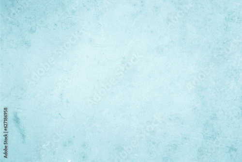 Blue light concrete texture for background in summer wallpaper. Cyan cement colour sand wall of tone vintage. Abstract teal dark color.