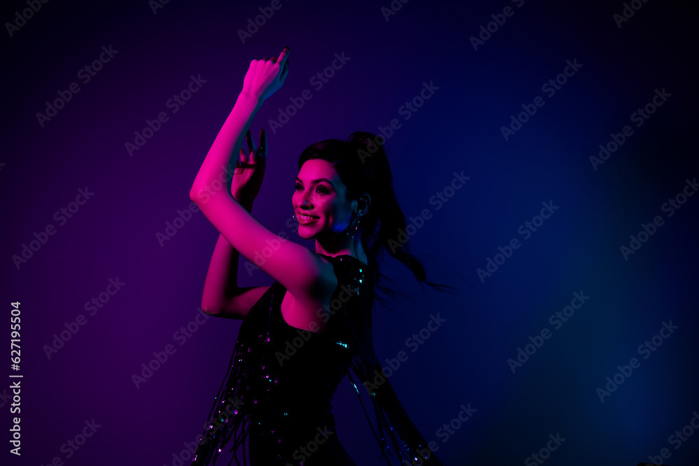 Photo of classy lady girlfriend dance energetic on modern discotheque occasion with futuristic neon light effects