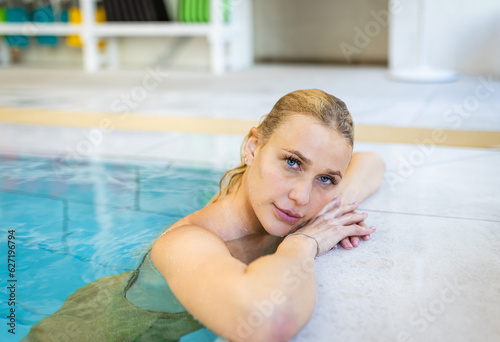 Beautiful adult woman enjoying relaxing day at the spa - Attractive adult female having a body care beauty treatment at wellness beauty centre