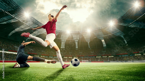 Motivated young women, football, soccer players during match, game, hitting ball, scoring winning goal. 3d arena, sports field. Concept of professional sport, competition, dynamics and game, ad