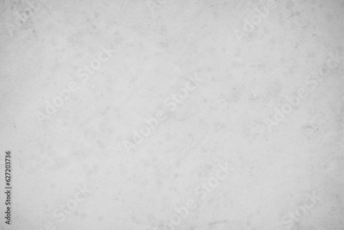 Concrete on stone texture for background in black, grey and white colors. Cement and sand wall of tone vintage. Close up retro plain white color concrete wall or grey colour texture cement stone work