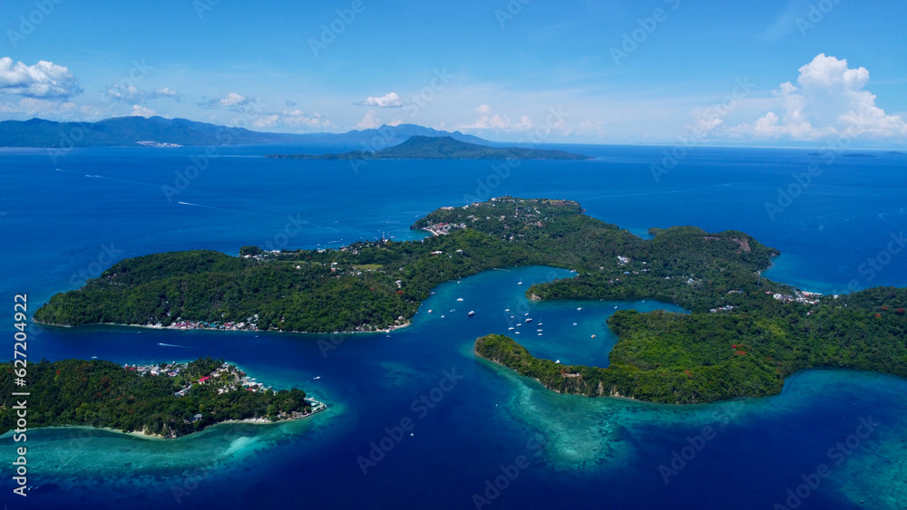 Tropical islands in the Pacific Ocean. Aerial view of islands, straits and sea.