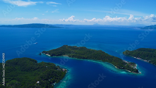 Tropical islands in the Pacific Ocean. Aerial view of islands, straits and sea.