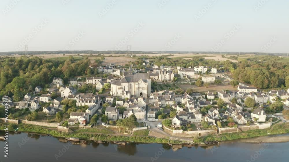 Aerial drone point of view of the village of Candes Saint Martin on the confluence of the Loire and Vienne rivers in central France. The village has been designated a beautiful village of France. Aerial drone point of view of the village of Candes Saint Martin on the confluence of the Loire and Vienne rivers in central France. The village has been designated a beautiful village of France.