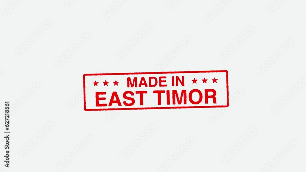 Close Up Real Hand Stamping Made In East Timor Stamp on White Background Close Up Real Hand Stamping Made In East Timor Stamp on White Background