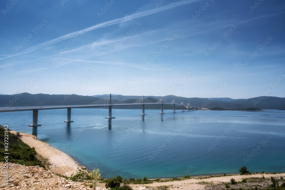 Amazing aerial view of the Peljesac bridge, which connects the mainland with the peninsula, near Ston in Croatia