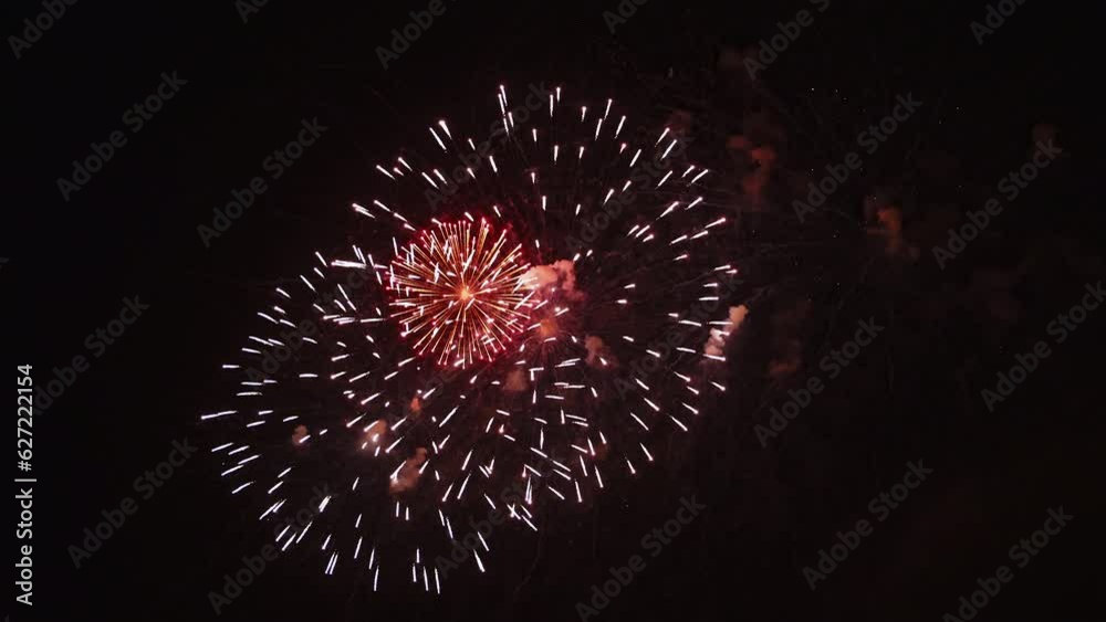 Slow Motion Fireworks Celebration 4K Opening Shot. Real Multicolor Shining Fireworks With Bokeh Lights in the Night Sky. Glowing Fireworks Show. Festival, Anniversary, Celebration, Party, New Year Slow Motion Fireworks Celebration 4K Opening Shot. Real Multicolor Shining Fireworks With Bokeh Lights in the Night Sky. Glowing Fireworks Show. Festival, Anniversary, Celebration, Party, New Year