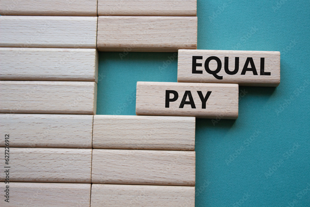 Equal Pay symbol Wooden blocks with words Equal Pay Beautiful grey Equal Pay symbol Wooden blocks with words Equal Pay Beautiful grey