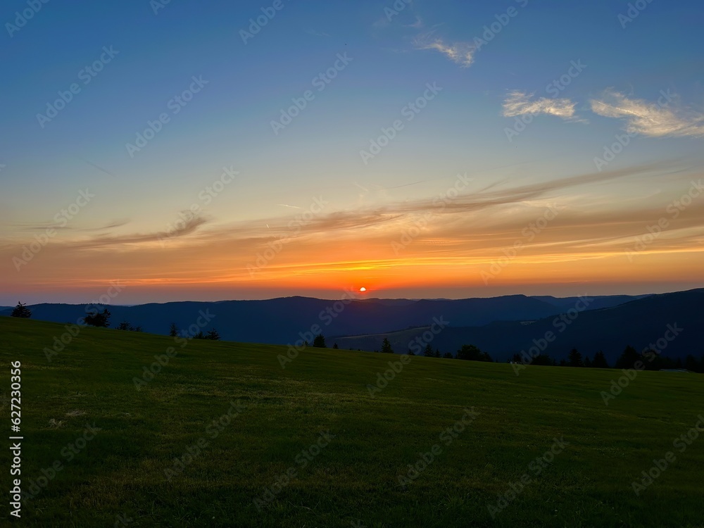 Dusk's Serenade: A Breathtaking Vosges Mountain Sunset Painting Land, Hills and Sky in Surreal Hues from the Trehkopf in the Markstein Dusk's Serenade: A Breathtaking Vosges Mountain Sunset Painting Land, Hills and Sky in Surreal Hues from the Trehkopf in the Markstein