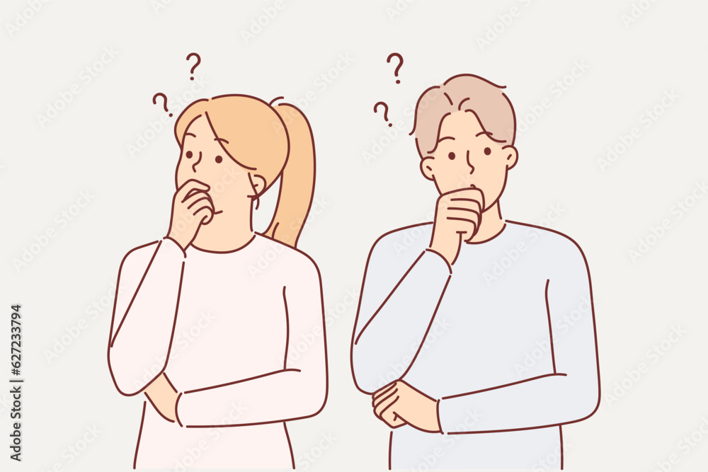 Thoughtful couple touches their chins in embarrassment when pondering important question Thoughtful couple touches their chins in embarrassment when pondering important question