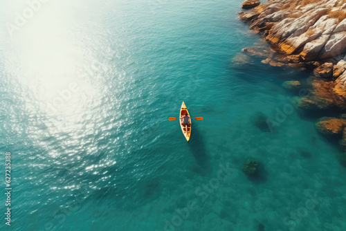 Couple On Kayak On Clear Sea Water, Drone View photo