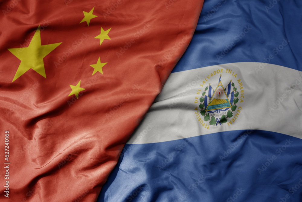 big waving national colorful flag of china and national flag of el salvador . big waving national colorful flag of china and national flag of el salvador .