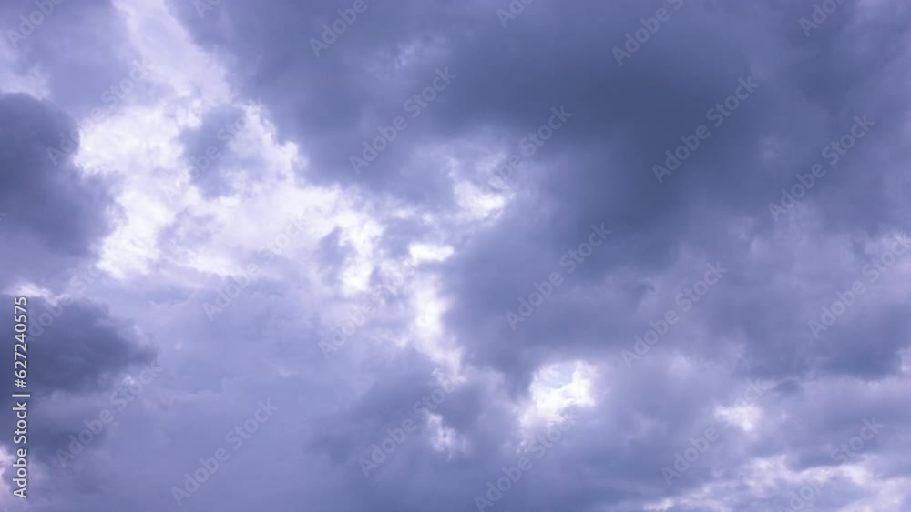 Clouds float across the blue sky and turn into thunderclouds. Summer sky before the rain, during the rain. time interval. 4k Clouds float across the blue sky and turn into thunderclouds. Summer sky before the rain, during the rain. time interval. 4k