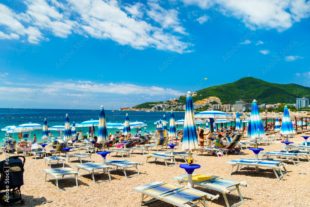 beautiful view of the sea beach and resort town, mountains, panorama of Budva in Montenegro, Adriatic Sea, tourism and summer travel