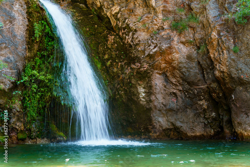 waterfall in the mountains, beautiful summer bright landscape