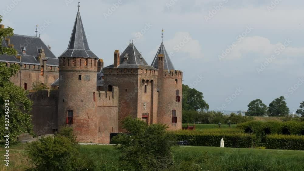 Muiderslot castle: general view of the pretty castle. In the Netherlands on a sunny day. Muiderslot castle: general view of the pretty castle. In the Netherlands on a sunny day.