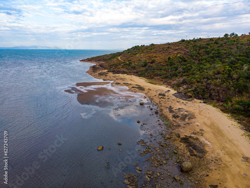 aerial drone panorama of cape pallarenda in townsville, north queensland, australia; remainings of forts in strategic defence location during the war near magnetic island photo