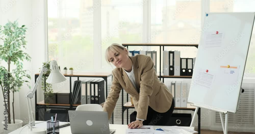 A Caucasian female entrepreneur dancing with happiness and seamlessly combining it with work in the office. With an infectious smile and enthusiastic movements, she creates a vibrant atmosphere. A Caucasian female entrepreneur dancing with happiness and seamlessly combining it with work in the office. With an infectious smile and enthusiastic movements, she creates a vibrant atmosphere.