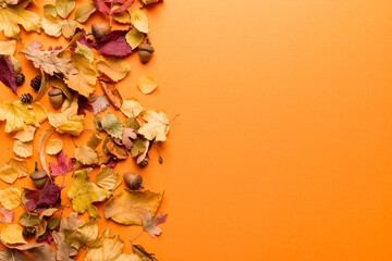 Autumn composition. Pattern made of dried leaves and other design accessories on table. Flat lay, top view