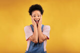 Portrait, surprise and woman with a smile, excited and announcement on a yellow studio background. Female person, happiness and model with shock, wtf and omg with news, winning and facial expression