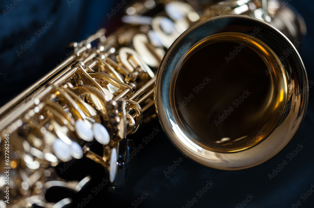 Close up image of saxaphone bell and keys Close up image of saxaphone bell and keys