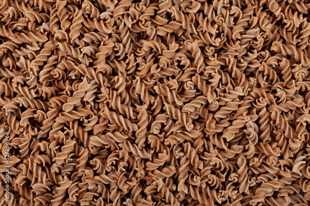 Uncooked Pasta di Lino, closeup. Flaxseed gluten free pasta is rich in