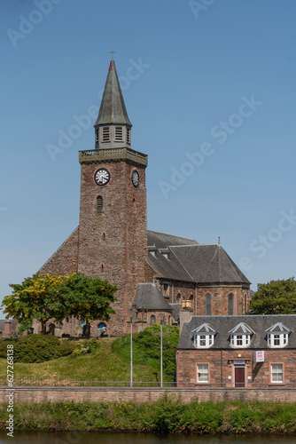 Inverness, Scotland, UK. 3 June 2023. The Old High Church in Inverness and business premises on the waterfront. photo