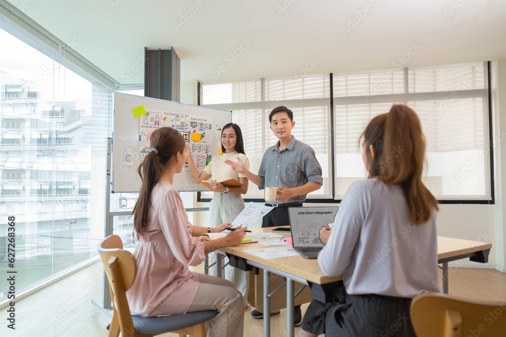 ux developer and ui designer presenting and testing mobile app interface designin meeting ux developer and ui designer presenting and testing mobile app interface designin meeting