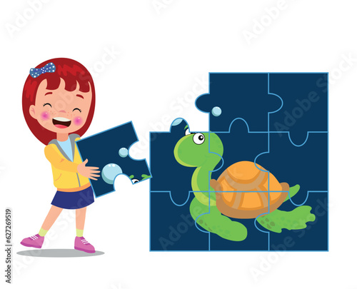 happy cute little kid play jigsaw puzzle