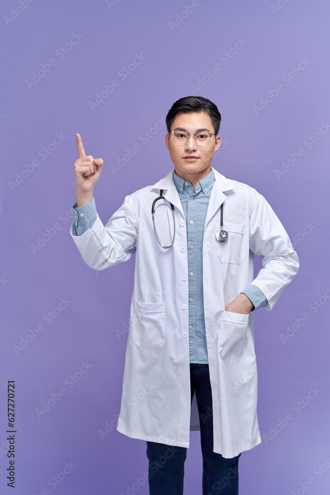 Doctor or medic pointing finger on invisible transparent screen with copy space and advertising area Doctor or medic pointing finger on invisible transparent screen with copy space and advertising area