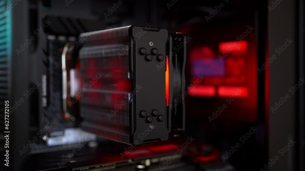 Dnieper. Ukraine 11.05.2023: Computer fan. DDR4. Modern case cooling system. Installation of HTPC, Hackintosh PC and Gaming PC with liquid cooling system and full ARGB lighting inside Dnieper. Ukraine 11.05.2023: Computer fan. DDR4. Modern case cooling system. Installation of HTPC, Hackintosh PC and Gaming PC with liquid cooling system and full ARGB lighting inside