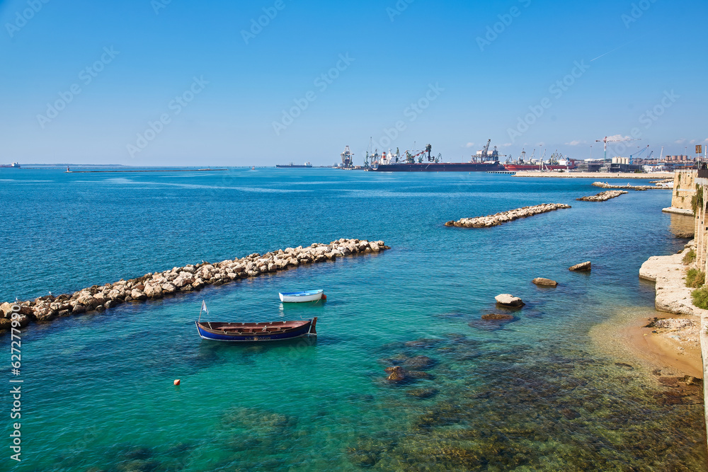 Overview with old fishing boats in the old city of Taranto, Puglia