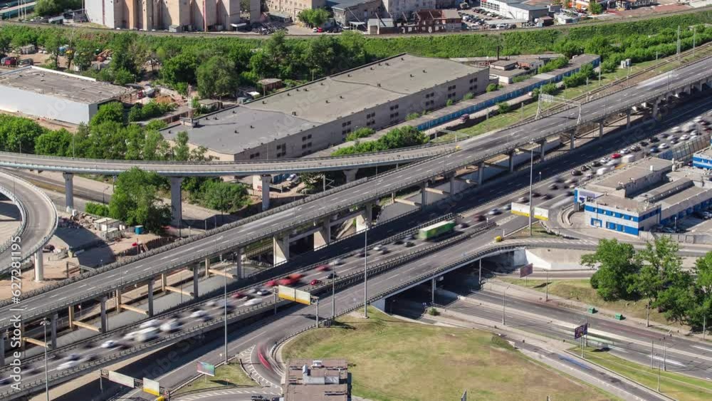 Aerial view from Skyscrapers of Moscow City business complex timelapse from top. Cars heavy traffic on the road intersection and overpass Aerial view from Skyscrapers of Moscow City business complex timelapse from top. Cars heavy traffic on the road intersection and overpass