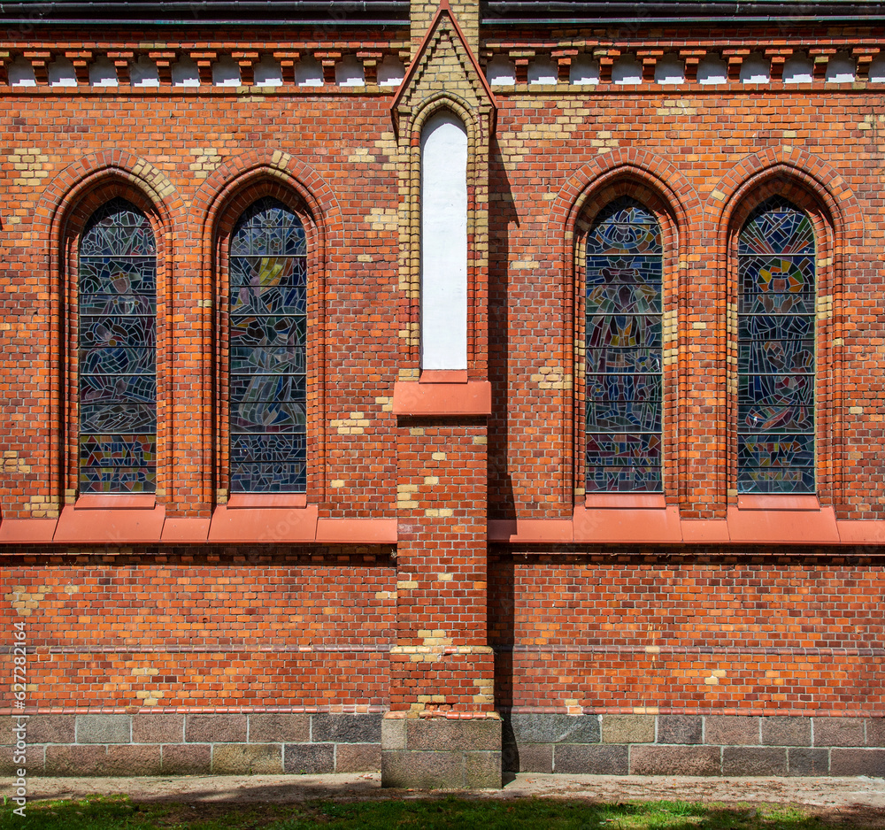 General view and architectural details in close-up and interior of the Catholic Church of Our Lady of the Angels built in 1914 in Lipsk, Podlasie, Poland. - obrazy, fototapety, plakaty 